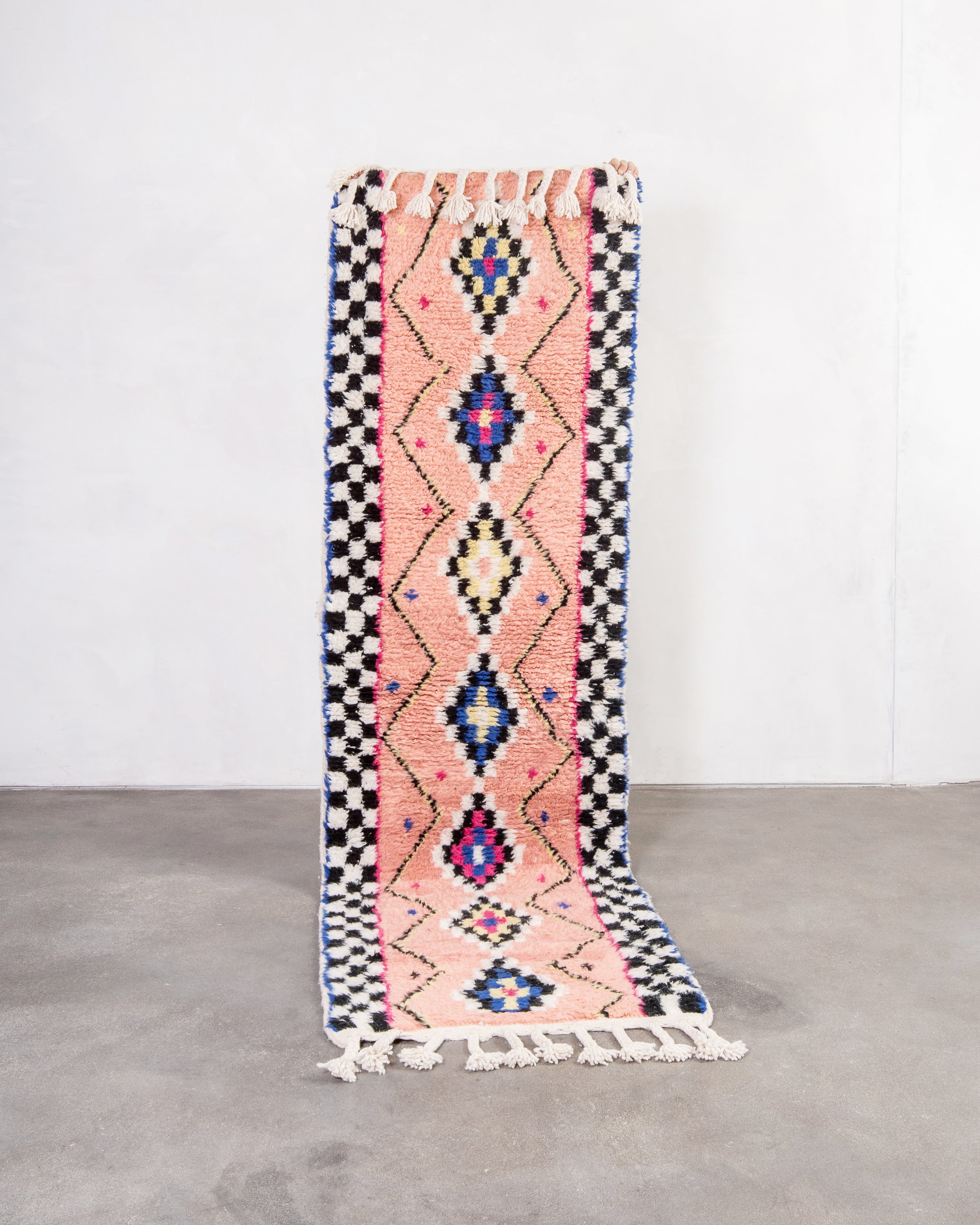 Modern, designer, handcrafted Berber rug from Morocco. Beniourain carpet with beautiful colors and patterns and fluffy wool texture.